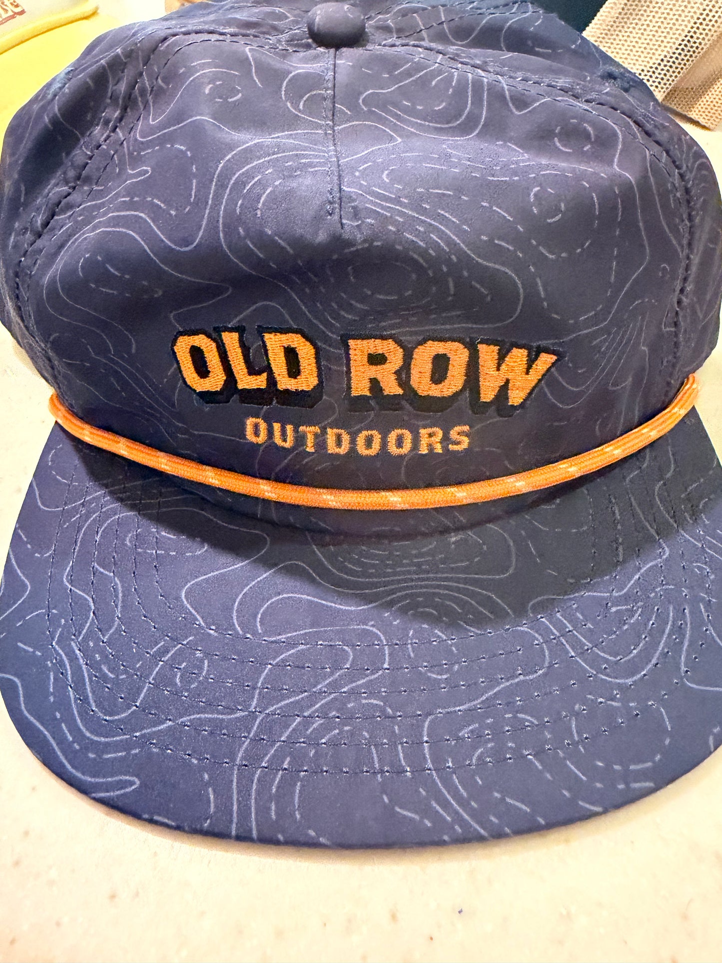 Old row outdoors orange rope hat