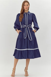 Navy dress with embroidered trim