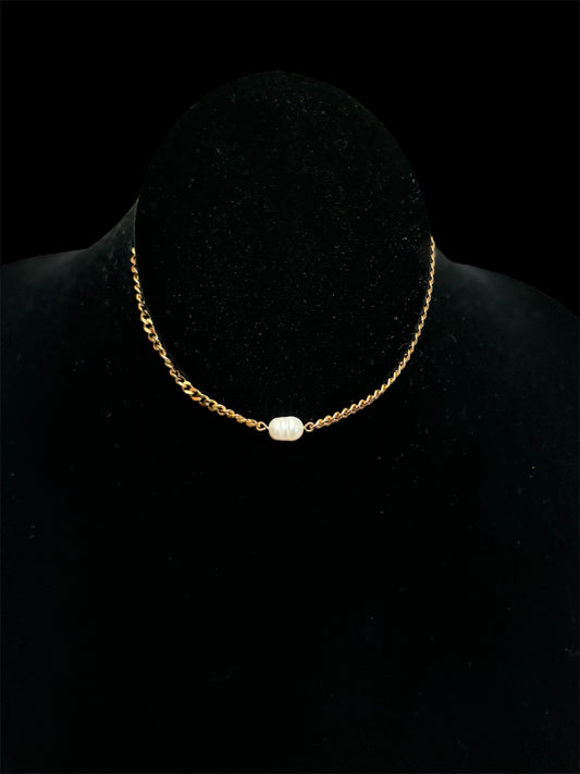 Haute Mess oval freshwater pearl on larger gold chain