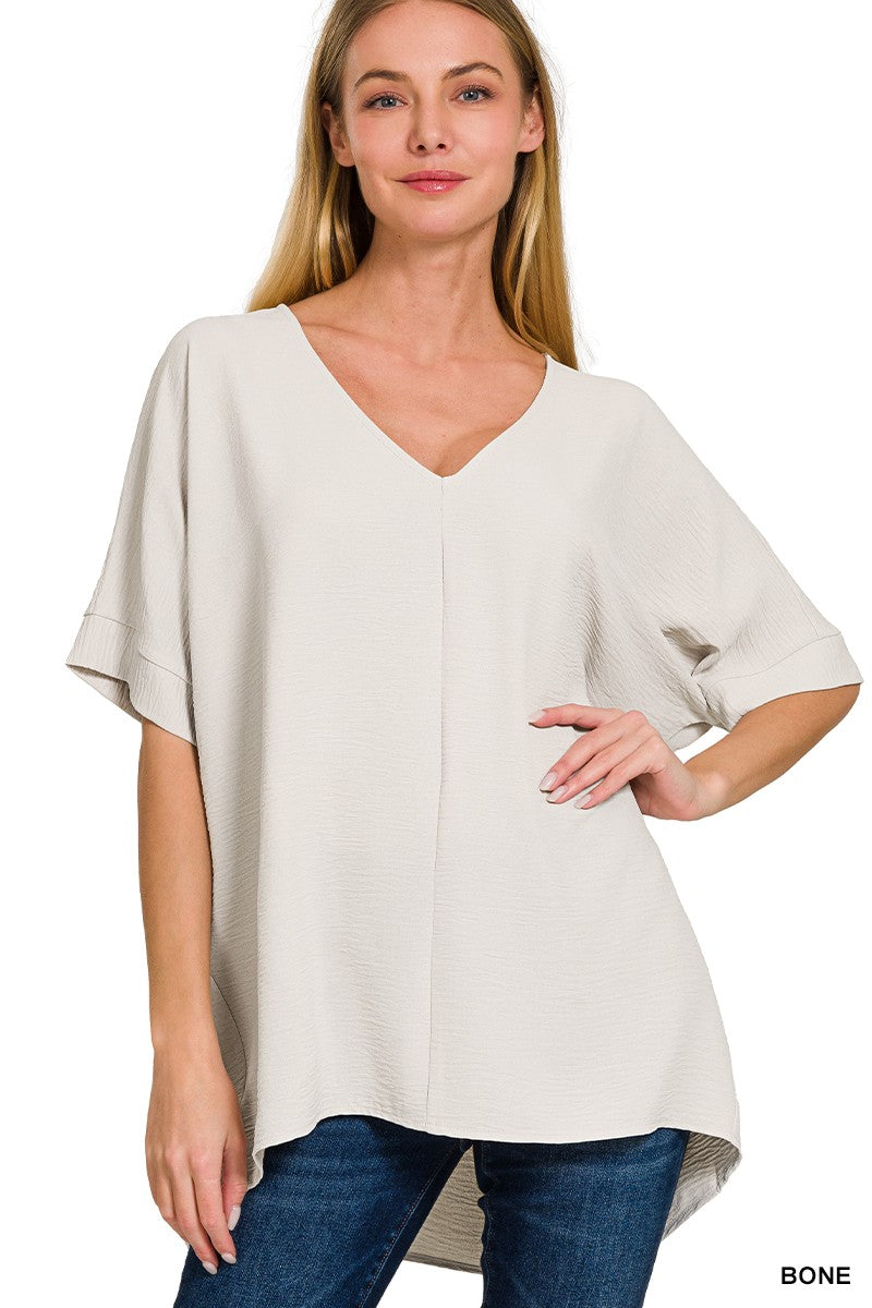 Zenana Bone Woven Airflow V-Neck Dolman Top