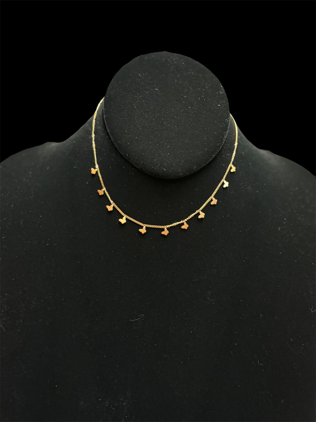 Haute Mess gold choker with small dangle butterfly charms