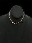 Haute Mess gold choker with small dangle butterfly charms