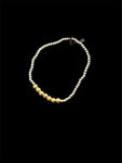 Haute Mess stretch bracelet, 7x gold beads with silver beads