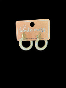 Haute Mess pave covered gold C-style hoop