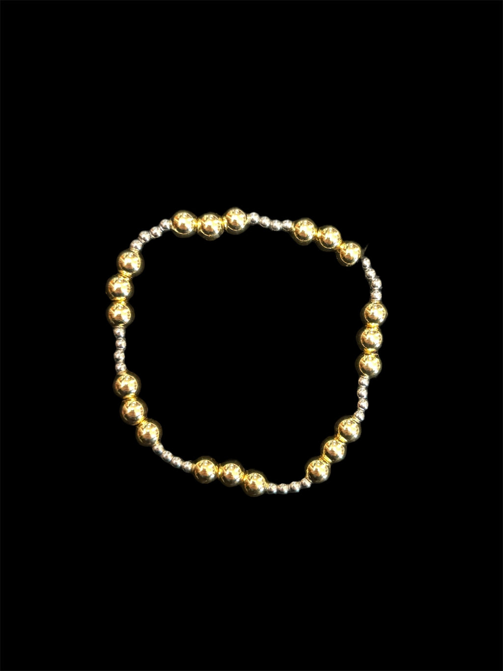 Haute Mess stretch bracelet, three 6mm gold beads with 2mm silver beads