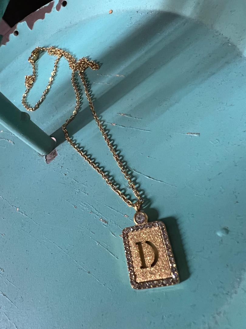 Haute Mess rectangle initial with cz around it